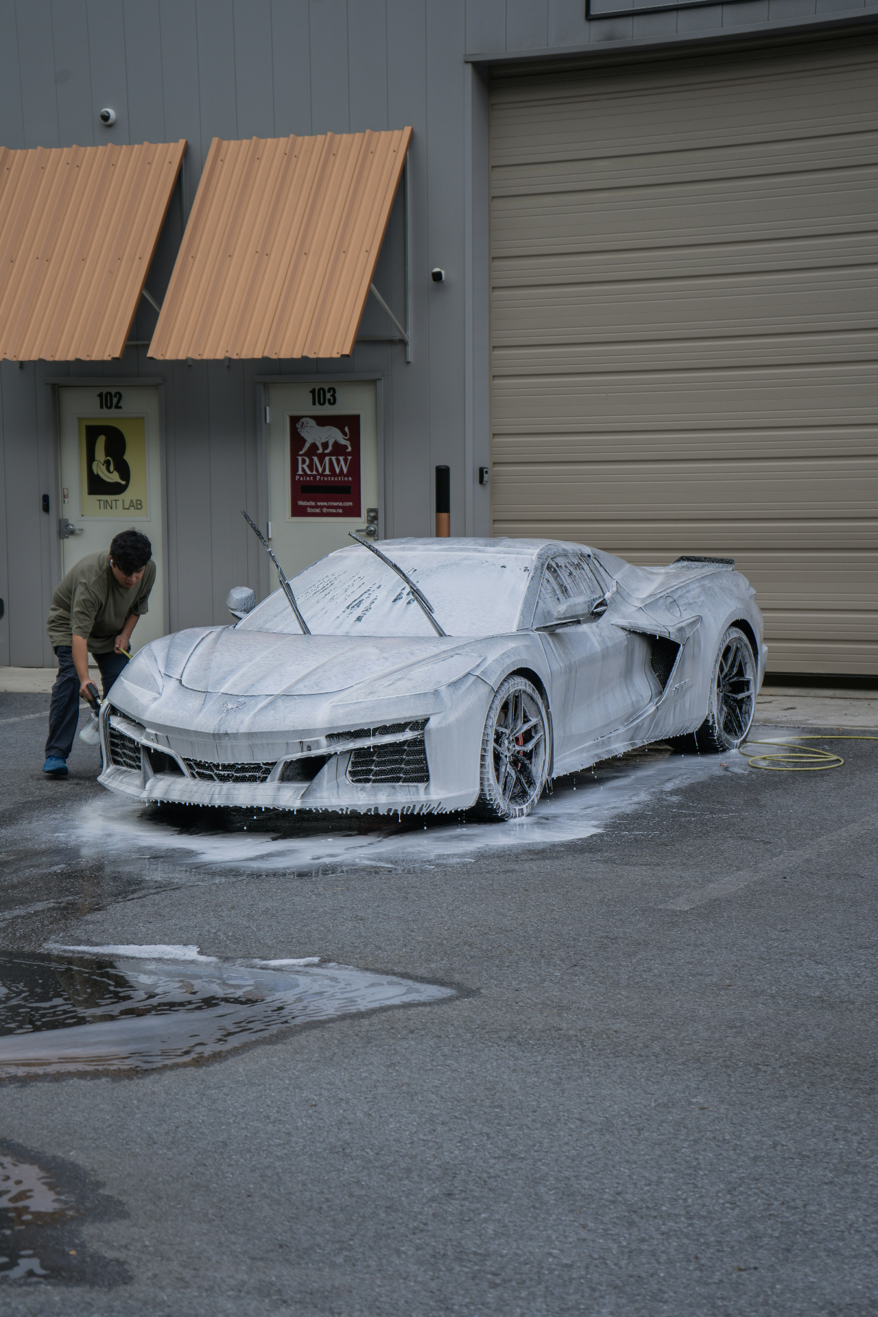 Hand wash exterior reset on a luxury vehicle