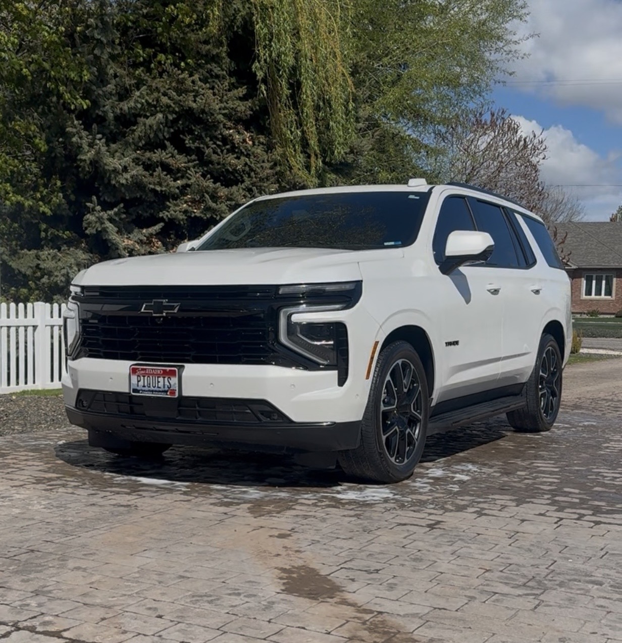 White Chevy Tahoe reset