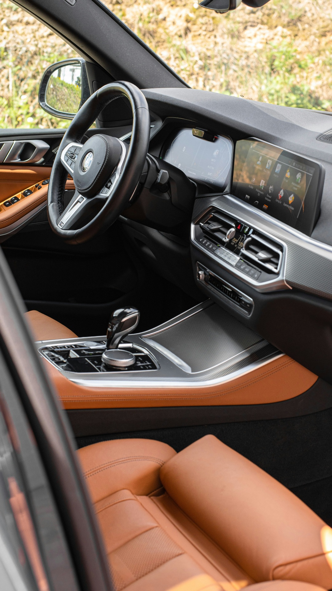 Clean BMW interior with cognac leather seats