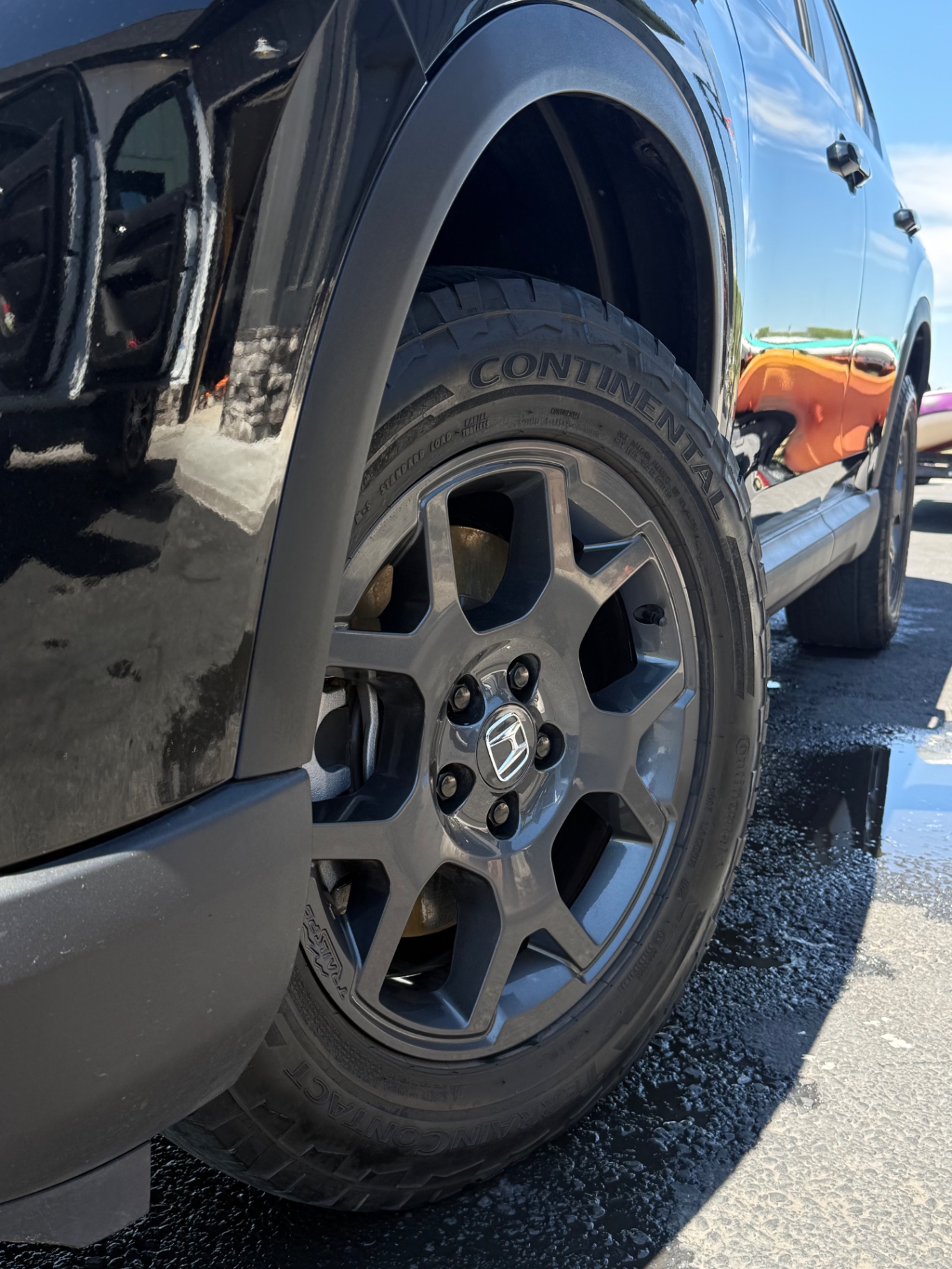 RV wheel and exterior cleaned during a mobile detail