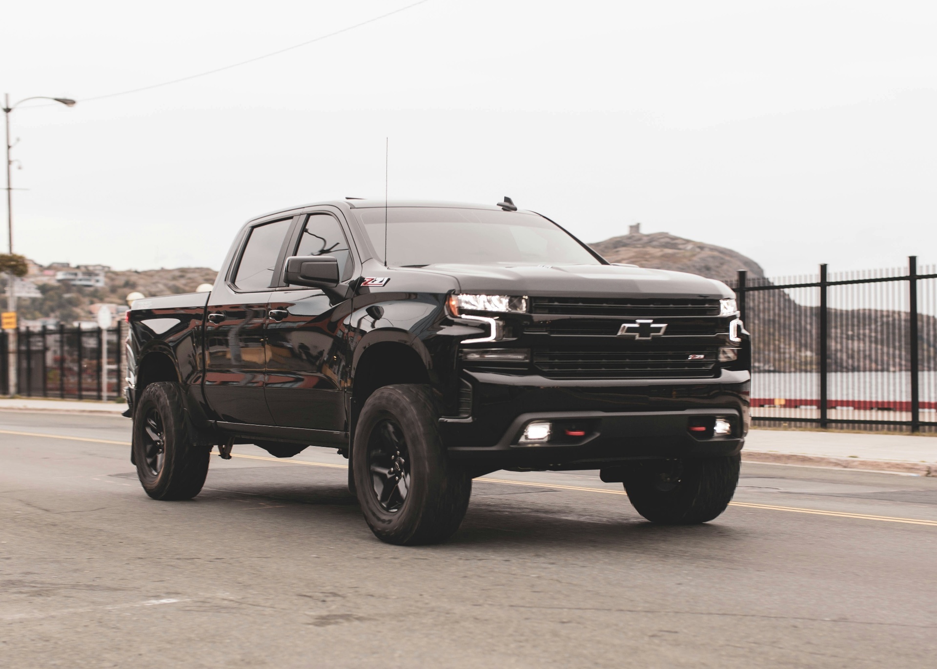 Clean black Chevrolet Silverado on the road