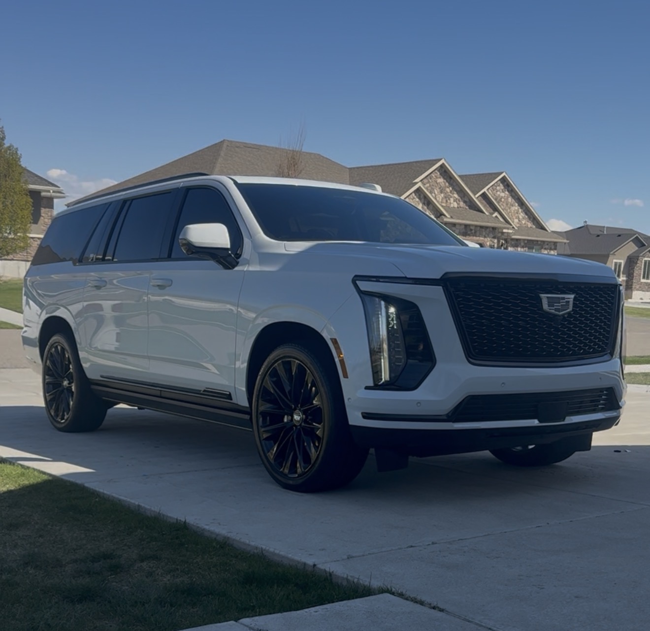 White Cadillac Escalade ESV
