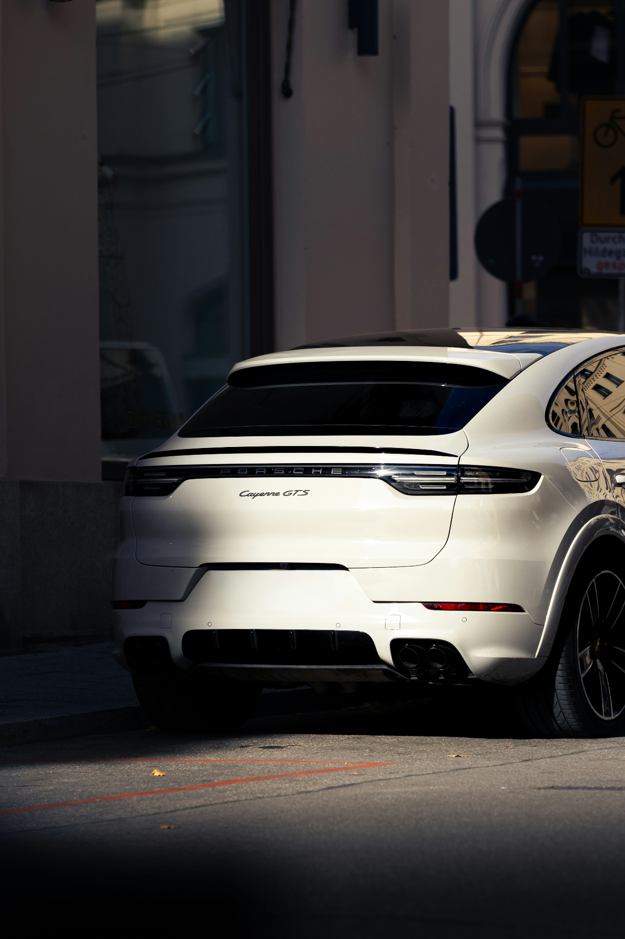 Clean white Porsche Cayenne GTS in bright natural light