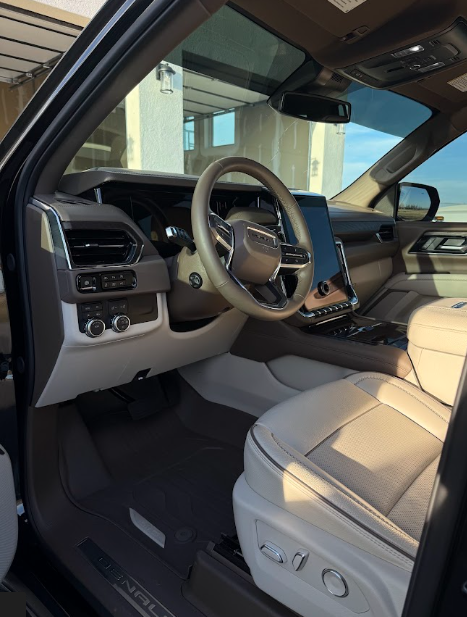 Detailed truck interior with clean seats, console, and dashboard