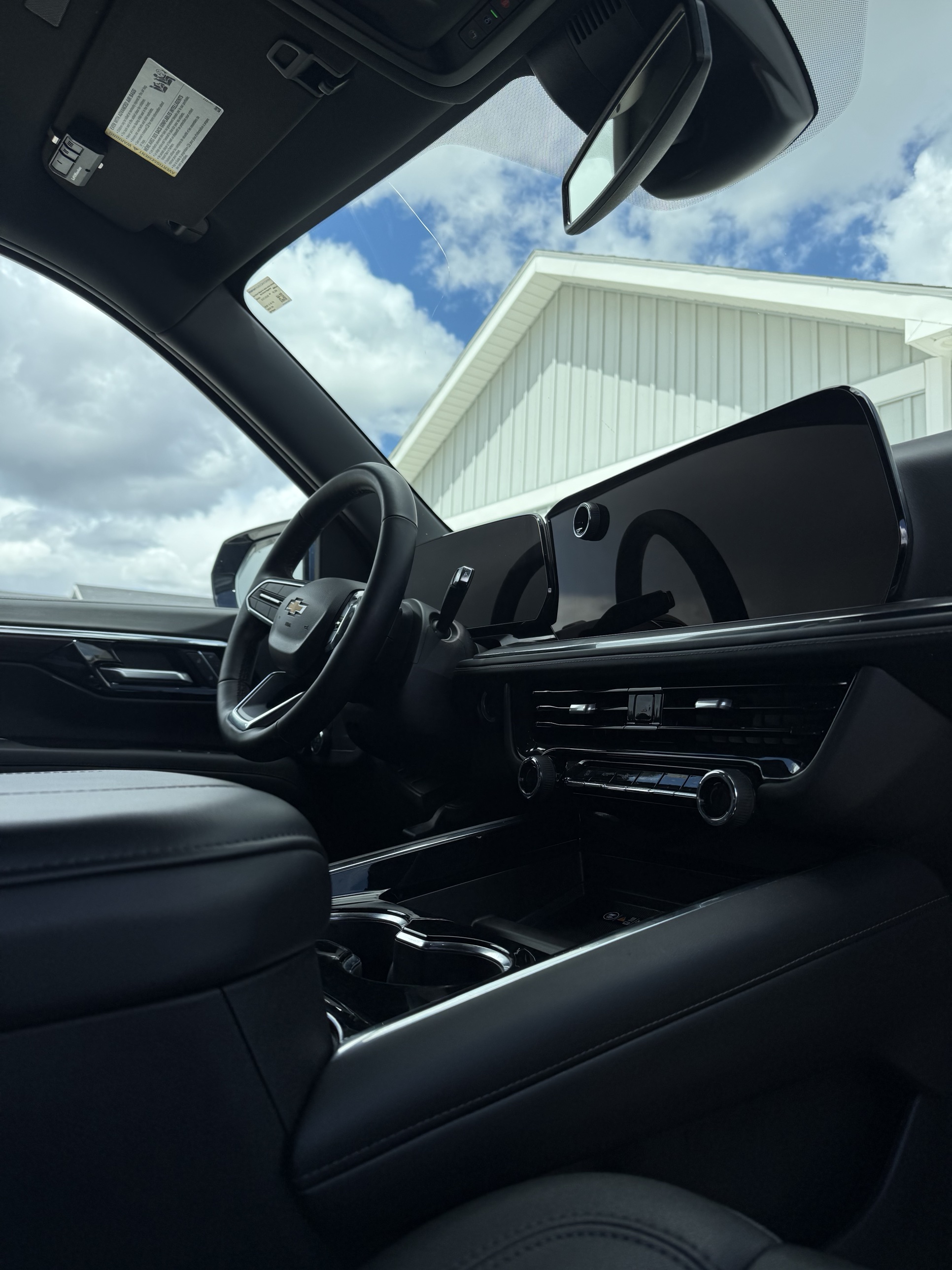 Chevrolet interior with dashboard and infotainment screen after a mobile detail