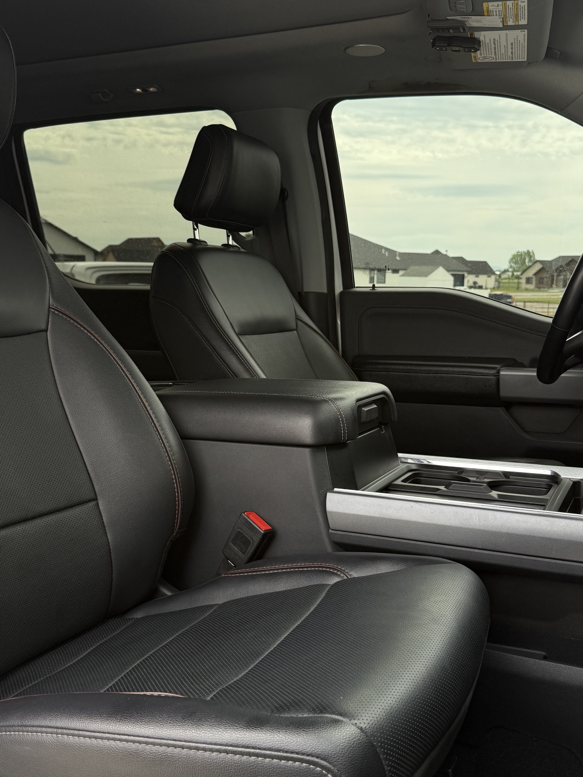 Ford truck front seats and console after a mobile interior detail